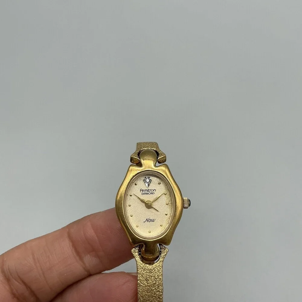 Armitron Diamond Now Womens Watch 17mm Oval Gold Tone Band New Battery 6.75